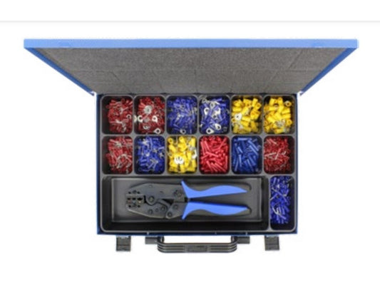 Assortment set of insulated cable lugs with crimping pliers and stripping pliers in metal box